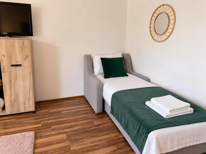 Fotoliul extensibil pentru a treia persoană